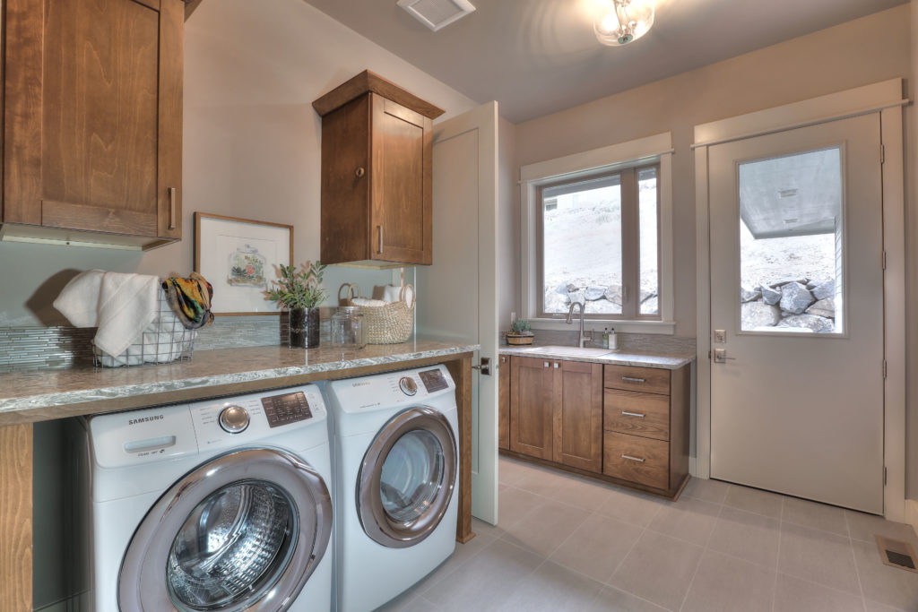 Laundry Utility Room of Residential Home featuring washer and dryer.